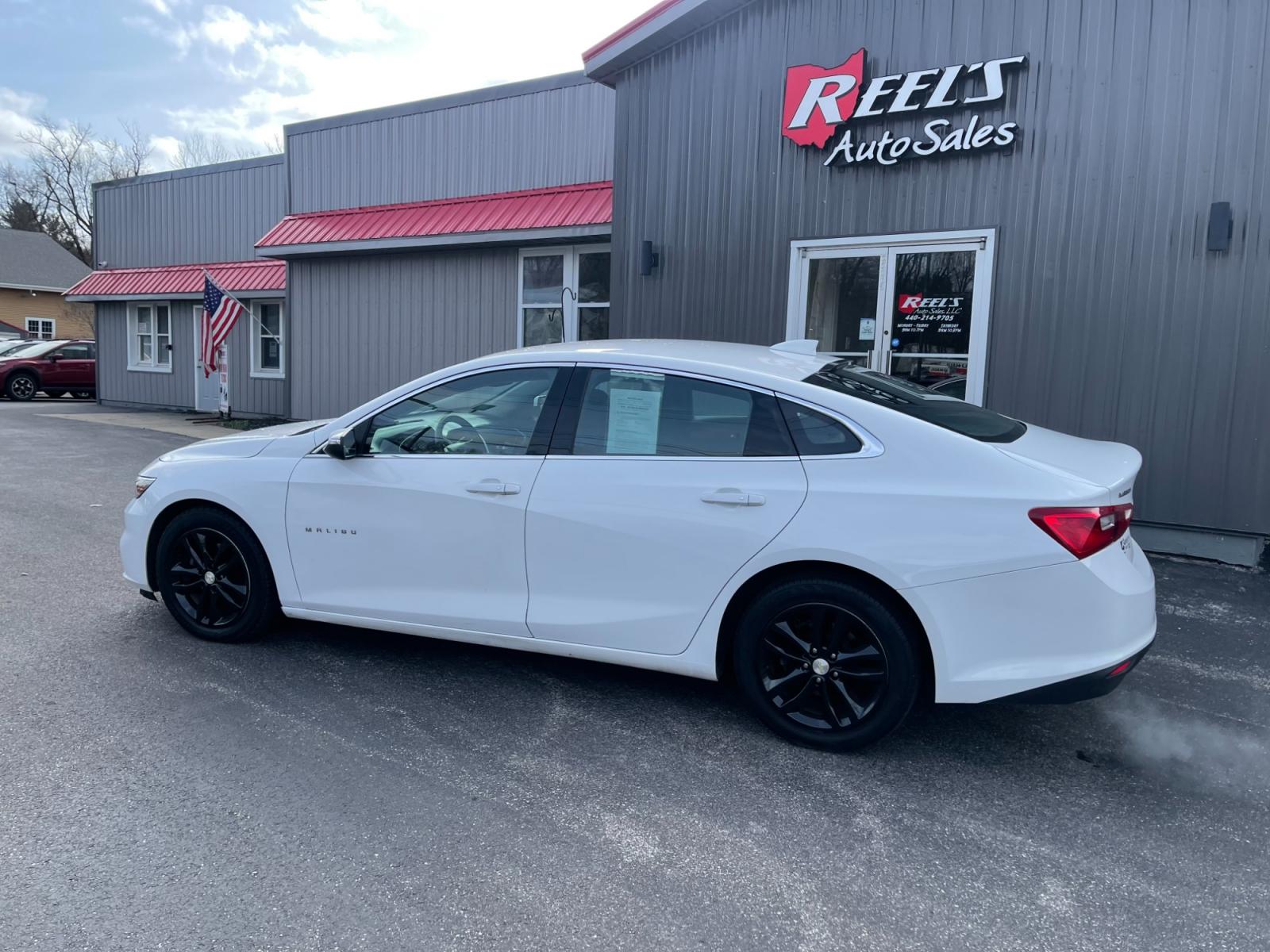 2016 White /Black Chevrolet Malibu 1LT (1G1ZE5ST7GF) with an 1.5L I4 DOHC 16V TURBO engine, 6A transmission, located at 11115 Chardon Rd. , Chardon, OH, 44024, (440) 214-9705, 41.580246, -81.241943 - This 2016 Chevrolet Malibu 1LT, is equipped with a 1.5L EcoTec engine and a 6-speed automatic transmission, offers a blend of efficiency and performance. It boasts modern amenities including a backup camera for enhanced safety during reversing, push-button start for convenience, and integrated Apple - Photo #12